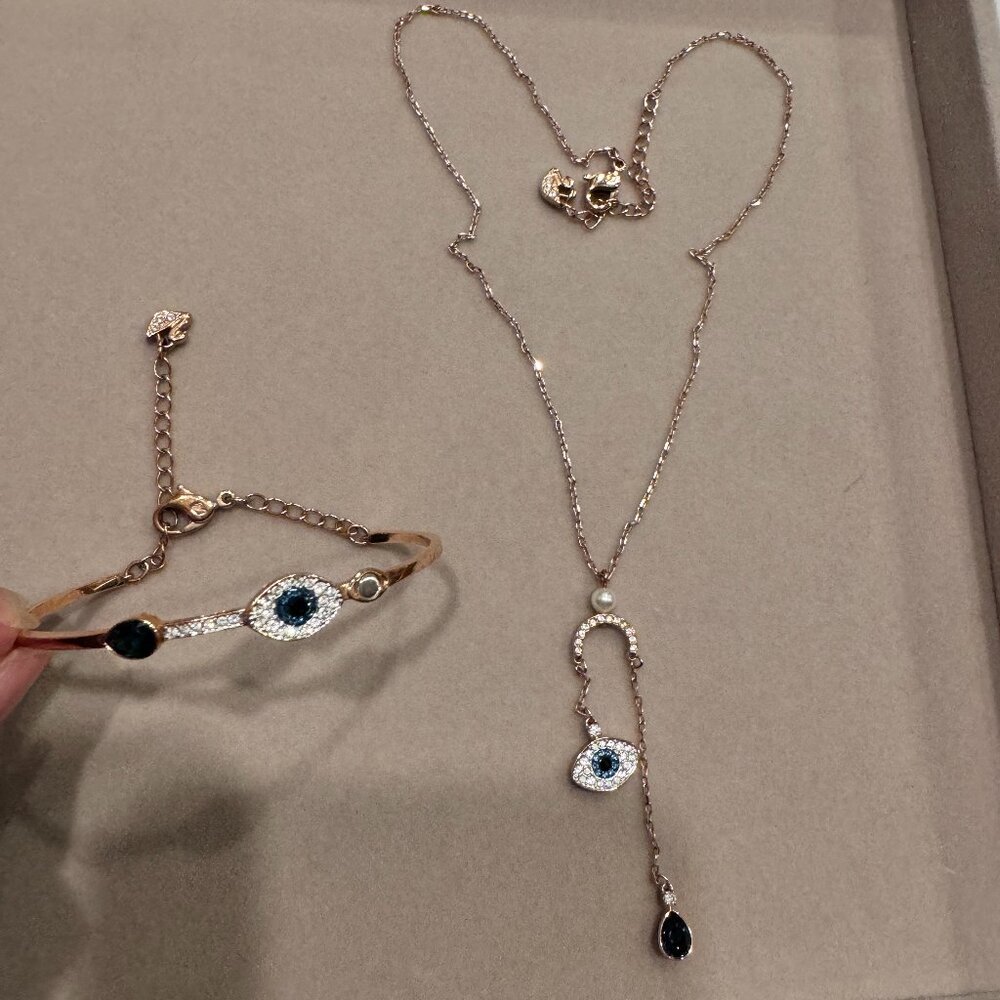 Swarovski Symbolic bangle Evil eye, Blue, Mixed metal finish